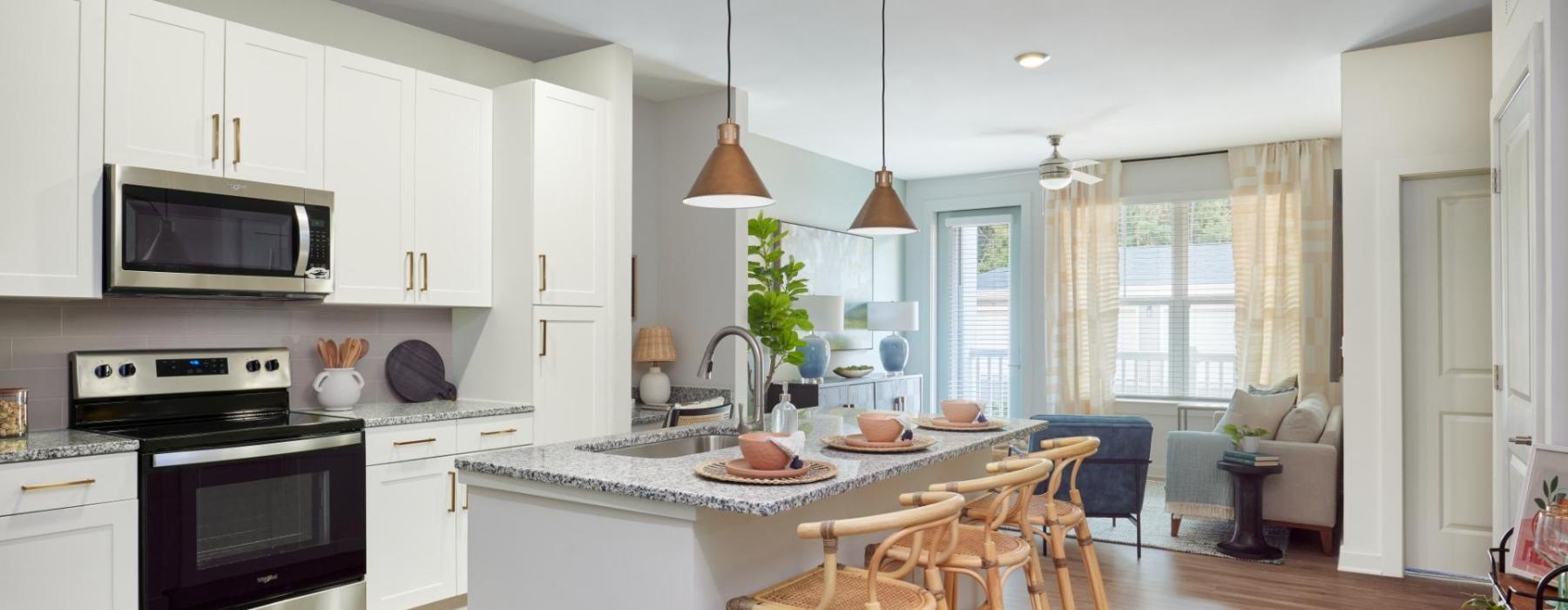 a kitchen with white cabinets