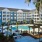 Resort-style swimming pool with grilling area