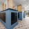 a mail room with blue mail boxes