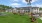 Community hammock garden surrounded by trees and greenery