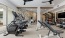 Fitness center with equipment and natural light 