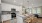 a kitchen with white cabinets