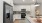 a kitchen with white cabinets