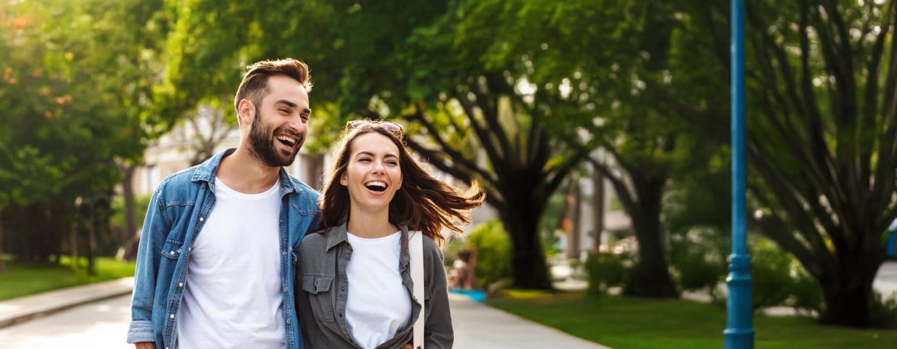 a couple walking down the street